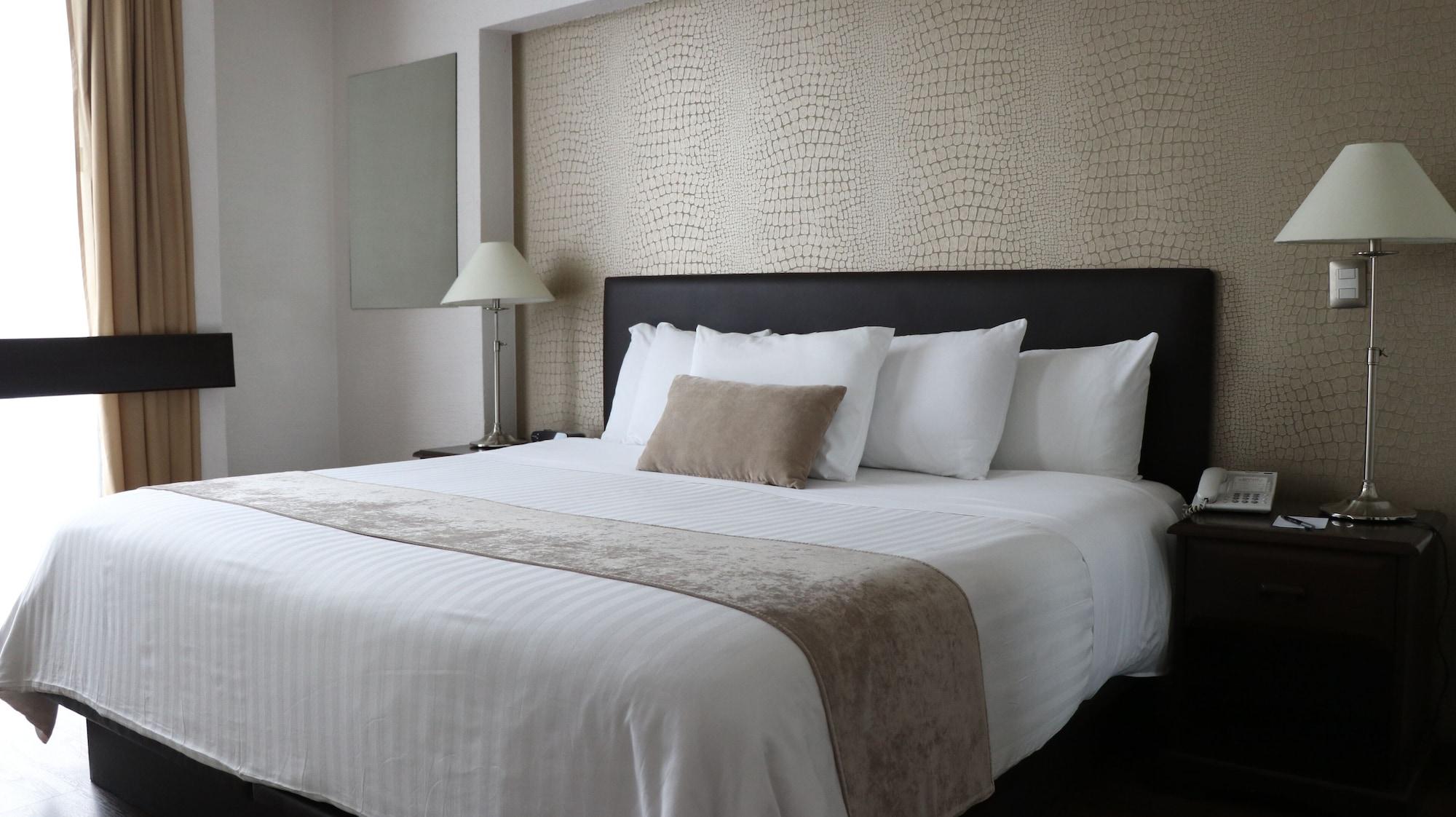 Meson Ejecutivo Guadalajara Minerva - Av Mexico Hotel Kültér fotó