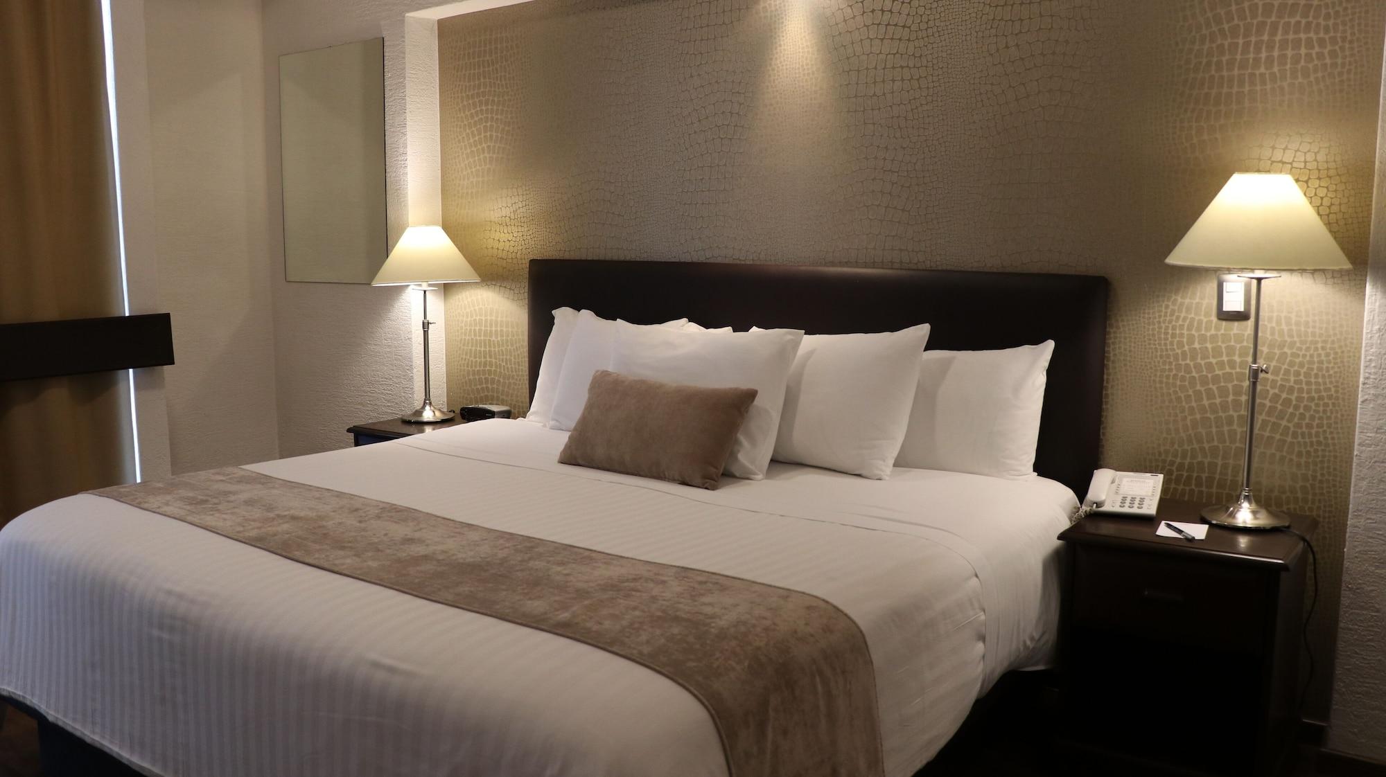 Meson Ejecutivo Guadalajara Minerva - Av Mexico Hotel Kültér fotó