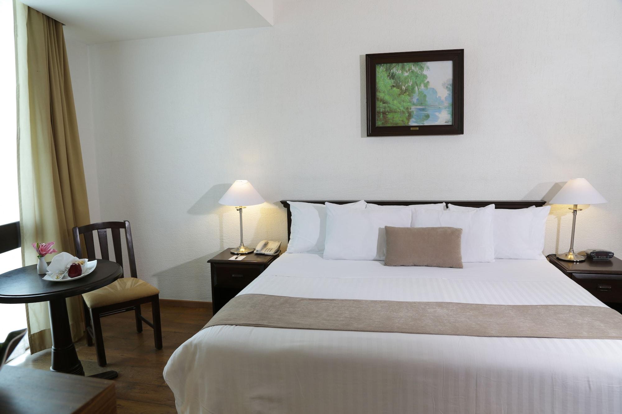 Meson Ejecutivo Guadalajara Minerva - Av Mexico Hotel Kültér fotó