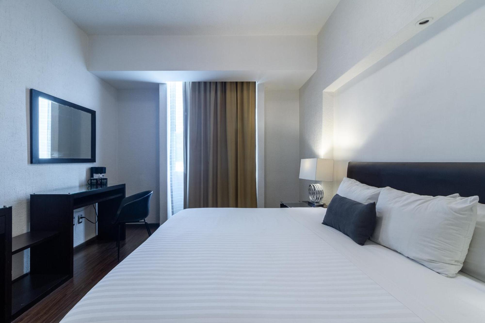 Meson Ejecutivo Guadalajara Minerva - Av Mexico Hotel Kültér fotó