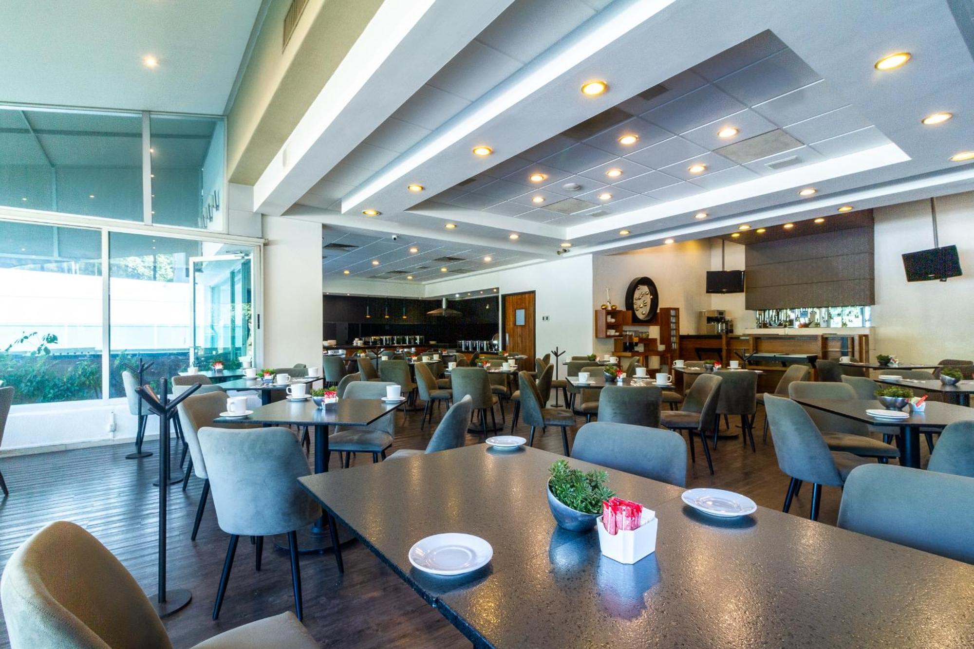 Meson Ejecutivo Guadalajara Minerva - Av Mexico Hotel Kültér fotó