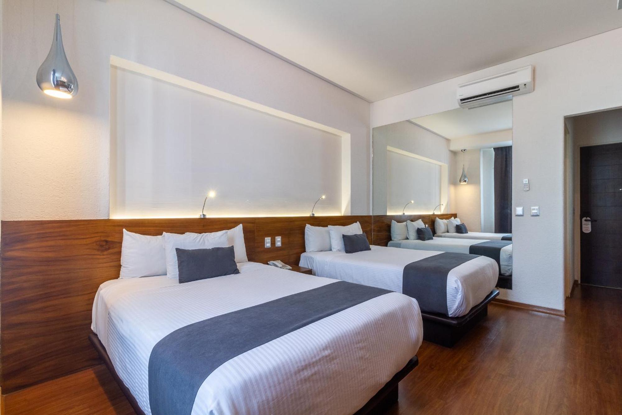 Meson Ejecutivo Guadalajara Minerva - Av Mexico Hotel Kültér fotó