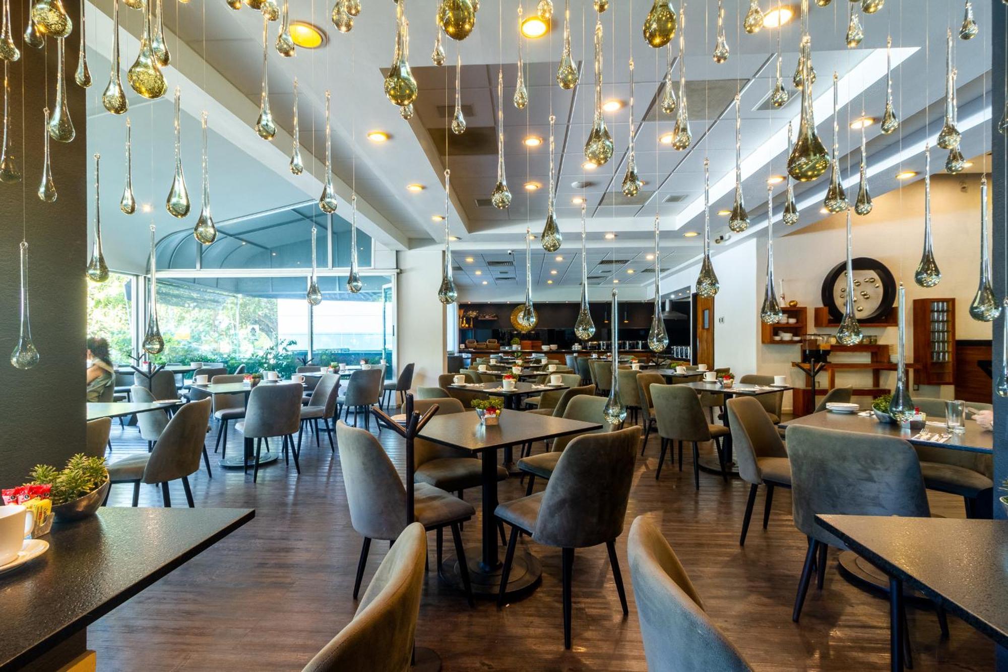 Meson Ejecutivo Guadalajara Minerva - Av Mexico Hotel Kültér fotó