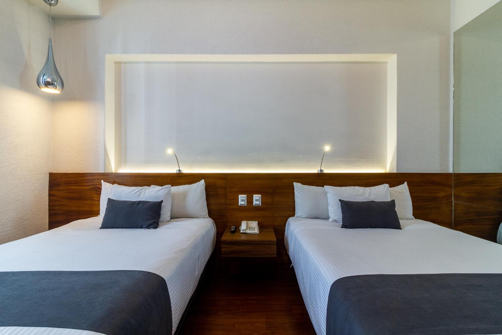 Meson Ejecutivo Guadalajara Minerva - Av Mexico Hotel Kültér fotó