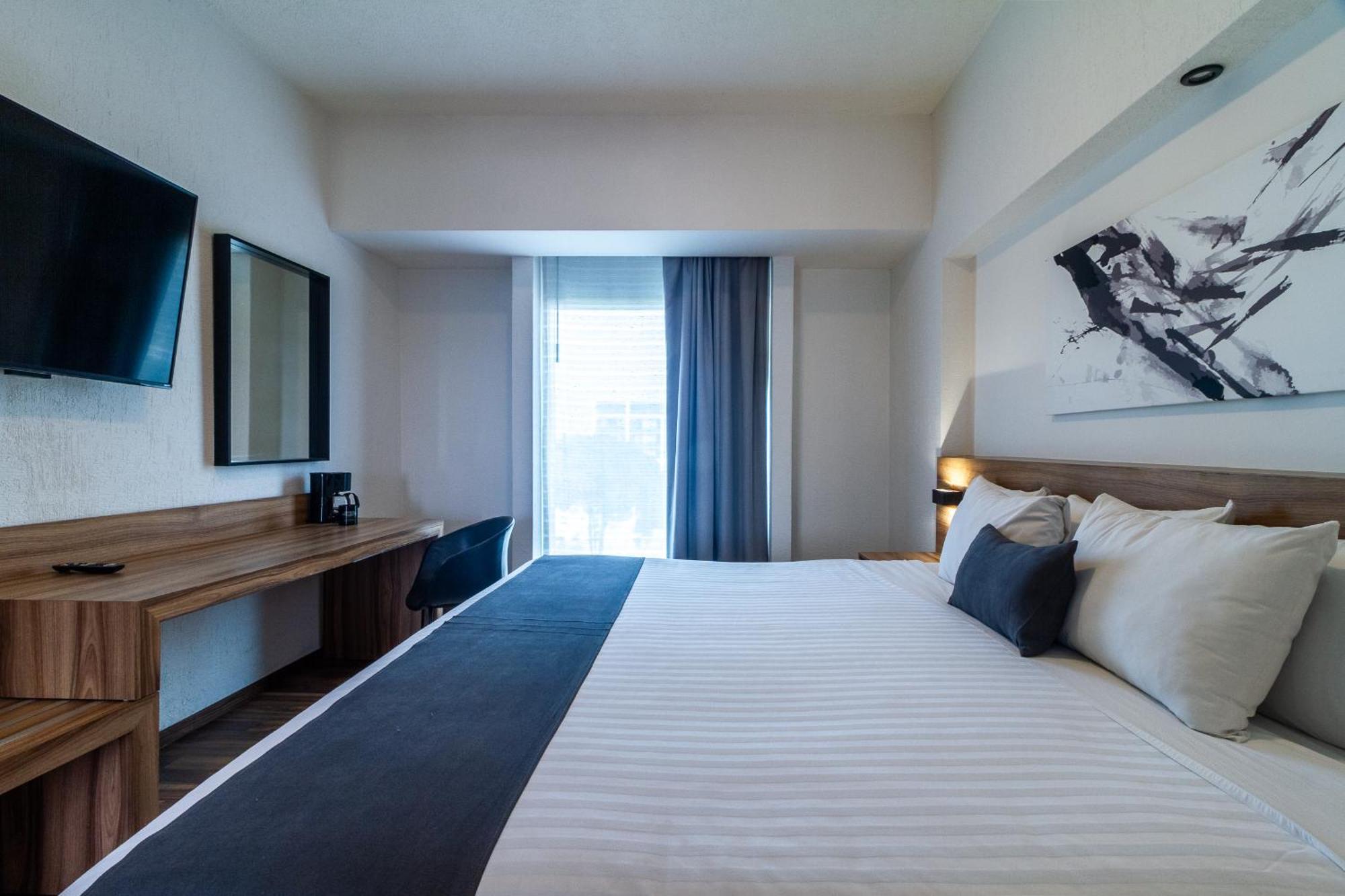 Meson Ejecutivo Guadalajara Minerva - Av Mexico Hotel Kültér fotó