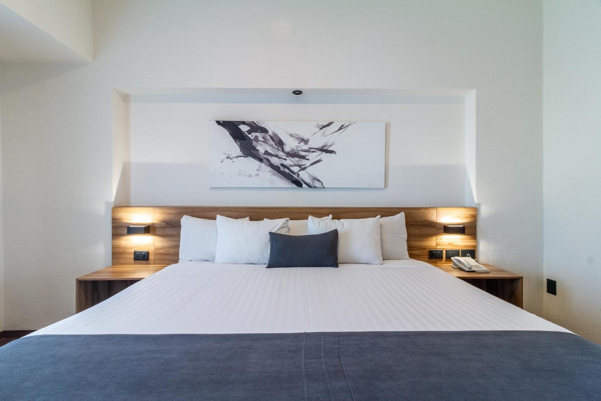 Meson Ejecutivo Guadalajara Minerva - Av Mexico Hotel Kültér fotó