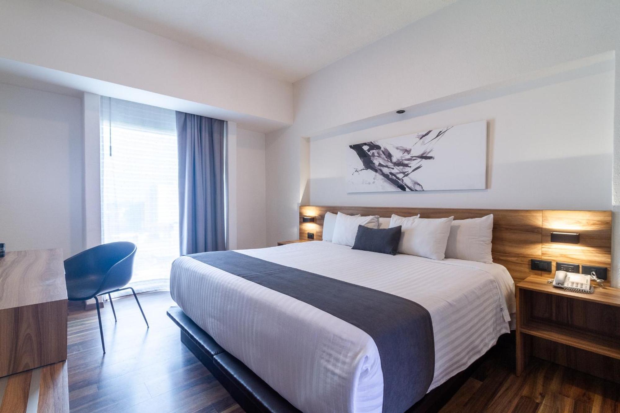 Meson Ejecutivo Guadalajara Minerva - Av Mexico Hotel Kültér fotó